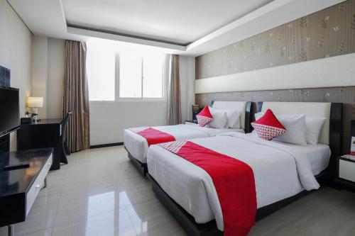 Imagen de la habitación del Hotel Townhouse Oak Denpasar at Mahendradatta. Foto 17