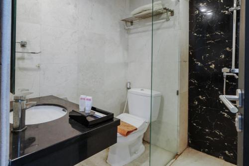 Imagen de la habitación del Hotel Townhouse Oak Denpasar at Mahendradatta. Foto 18