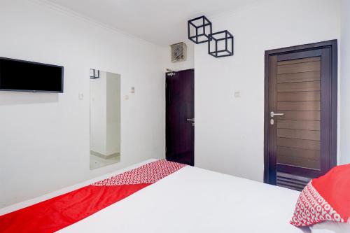 Imagen general del Hotel Townhouse Oak Gunung Sahari Near Ancol. Foto 7