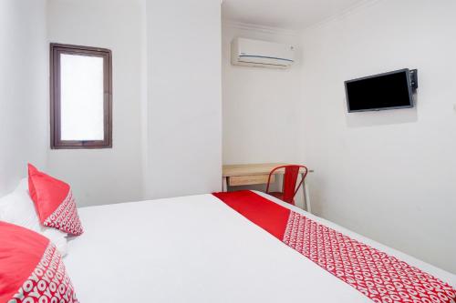 Imagen de la habitación del Hotel Townhouse Oak Gunung Sahari Near Ancol. Foto 17