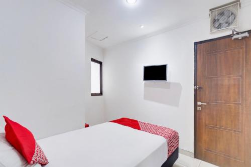 Imagen de la habitación del Hotel Townhouse Oak Gunung Sahari Near Ancol. Foto 18