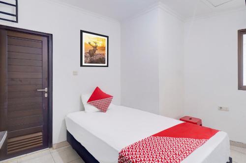 Imagen de la habitación del Hotel Townhouse Oak Gunung Sahari Near Ancol. Foto 19