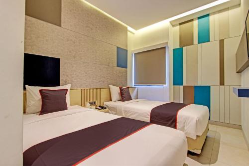 Imagen de la habitación del Hotel Townhouse Oak Ixo. Foto 17