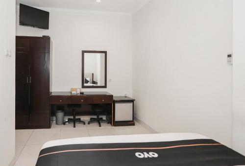 Imagen general del Hotel Townhouse Oak J&b Gunung Sahari. Foto 6