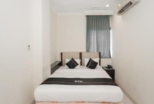 Imagen general del Hotel Townhouse Oak J&b Gunung Sahari. Foto 7