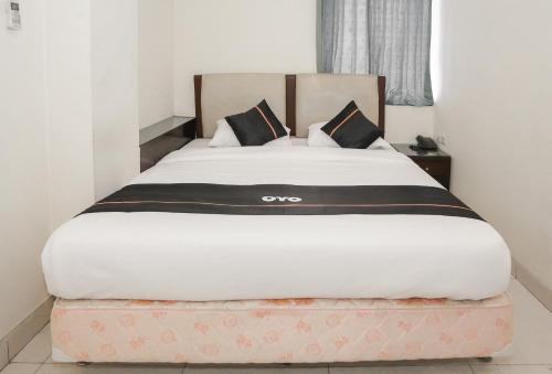 Imagen de la habitación del Hotel Townhouse Oak J&b Gunung Sahari. Foto 18