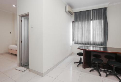 Imagen general del Hotel Townhouse Oak J&b Gunung Sahari. Foto 11