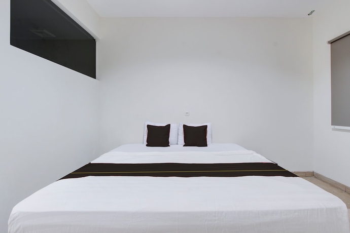 Imagen de la habitación del Hotel Townhouse Oak near The Park Mall Solo. Foto 8