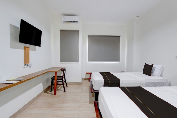 Imagen de la habitación del Hotel Townhouse Oak near The Park Mall Solo. Foto 11