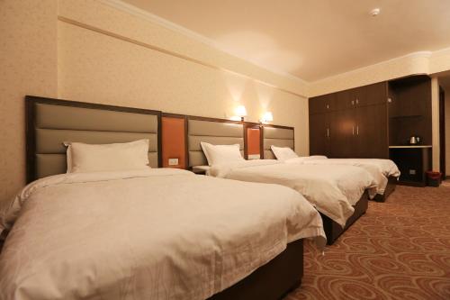 Imagen de la habitación del Hotel Towns Well Motel. Foto 4