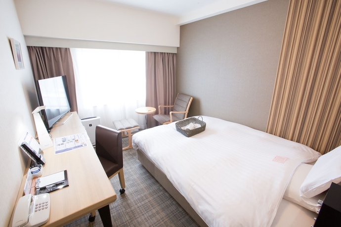Imagen de la habitación del Hotel Toyama Chitetsu. Foto 9