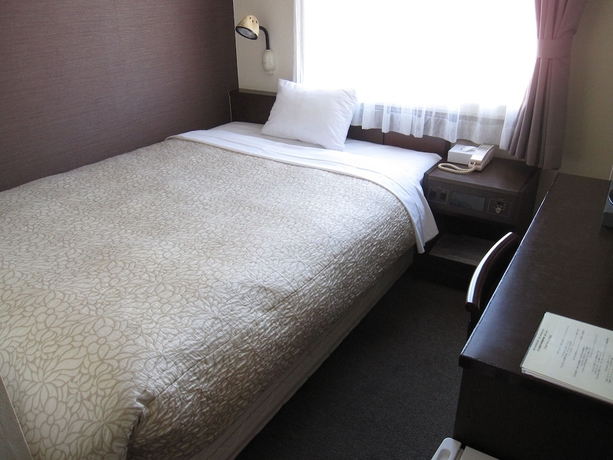Imagen de la habitación del Hotel Toyohashi Station. Foto 4