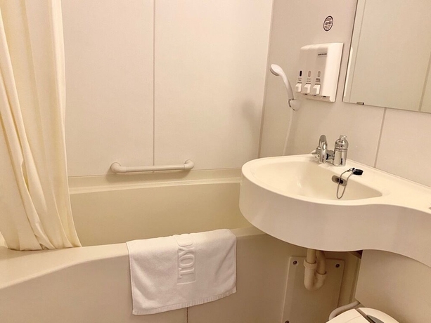 Imagen de la habitación del Hotel Toyoko Inn Gifu Hashima Station Shinkansen Minami. Foto 10