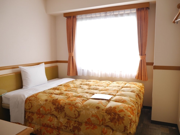 Imagen de la habitación del Hotel Toyoko Inn Gumma Ota Station Minami. Foto 13