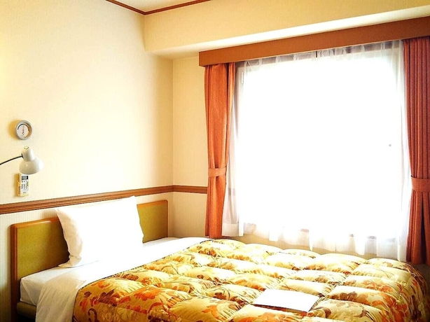 Imagen de la habitación del Hotel Toyoko Inn Higashi Hiroshima Station. Foto 10