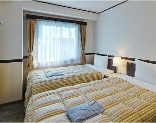 Imagen de la habitación del Hotel Toyoko Inn Hokkaido Sapporo Station Nishi Hokudai Mae. Foto 12
