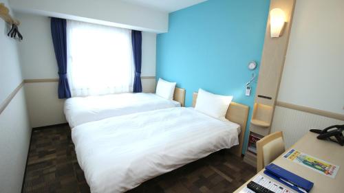 Imagen de la habitación del Hotel Toyoko Inn Kasukabe-eki Nishi-guchi. Foto 18
