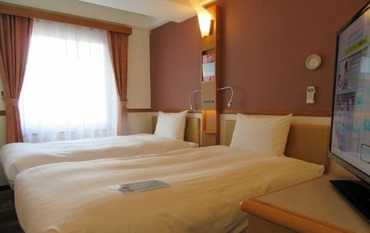 Imagen de la habitación del Hotel Toyoko Inn Kawasaki Station Shiyakusho Dori. Foto 3
