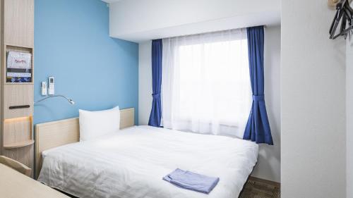 Imagen de la habitación del Hotel Toyoko Inn Kita-asaka-eki Nishi-guchi. Foto 13