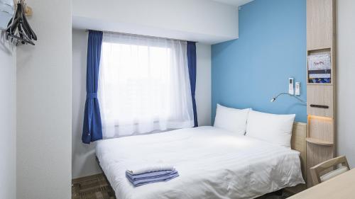 Imagen de la habitación del Hotel Toyoko Inn Kita-asaka-eki Nishi-guchi. Foto 14
