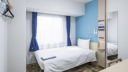 Imagen de la habitación del Hotel Toyoko Inn Kita-asaka-eki Nishi-guchi. Foto 15