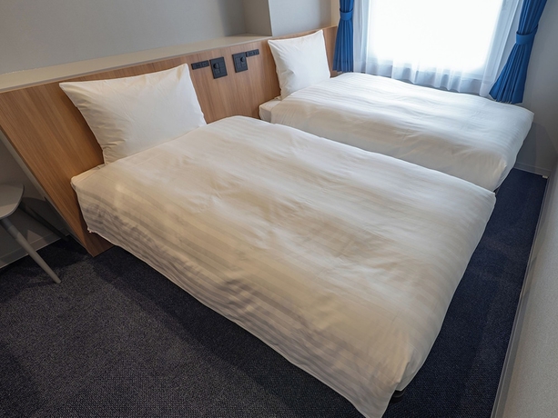 Imagen de la habitación del Hotel Toyoko Inn Kitakami-eki Nishi-guchi. Foto 3