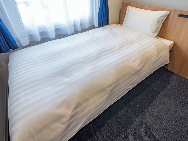 Imagen de la habitación del Hotel Toyoko Inn Kitakami-eki Nishi-guchi. Foto 7