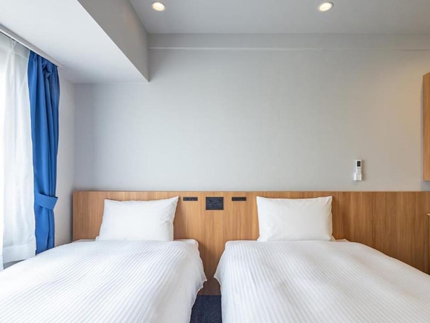 Imagen de la habitación del Hotel Toyoko Inn Kure-eki. Foto 13