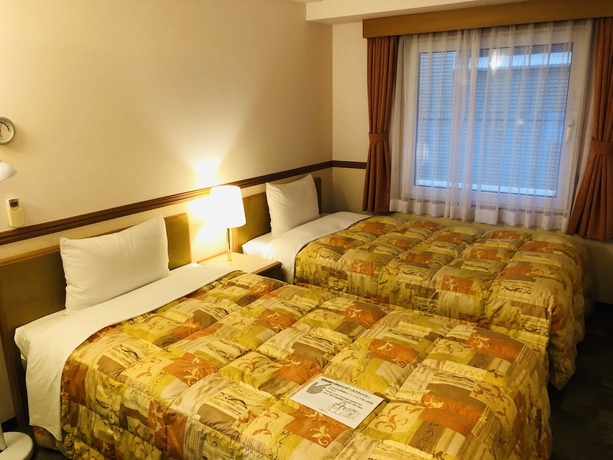 Imagen de la habitación del Hotel Toyoko Inn Niigata Furumachi. Foto 2