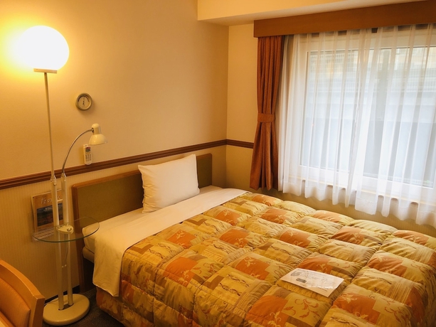 Imagen de la habitación del Hotel Toyoko Inn Niigata Furumachi. Foto 3