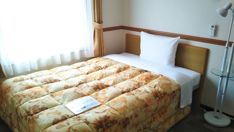 Imagen de la habitación del Hotel Toyoko Inn Nishitetsu Kurume Station. Foto 2