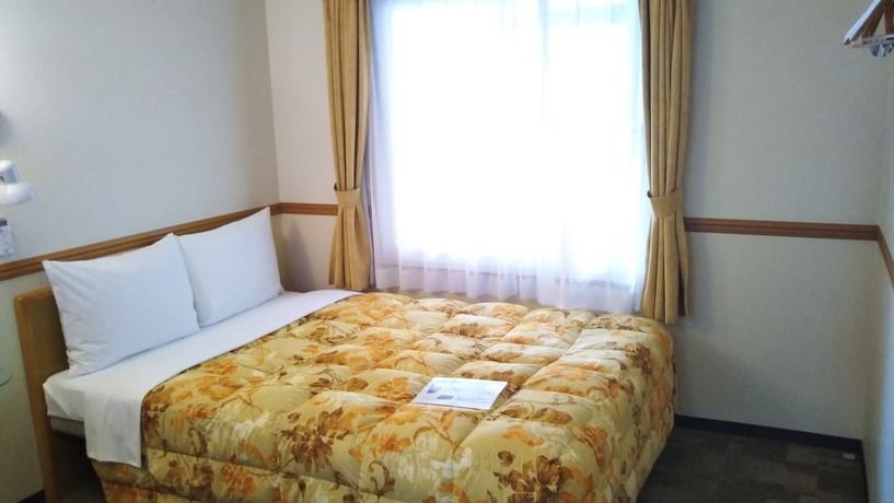 Imagen de la habitación del Hotel Toyoko Inn Nishitetsu Kurume Station. Foto 3