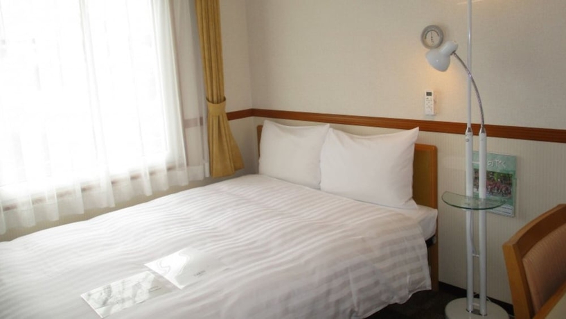 Imagen de la habitación del Hotel Toyoko Inn Okinawa Naha Omoromachi Ekimae. Foto 2