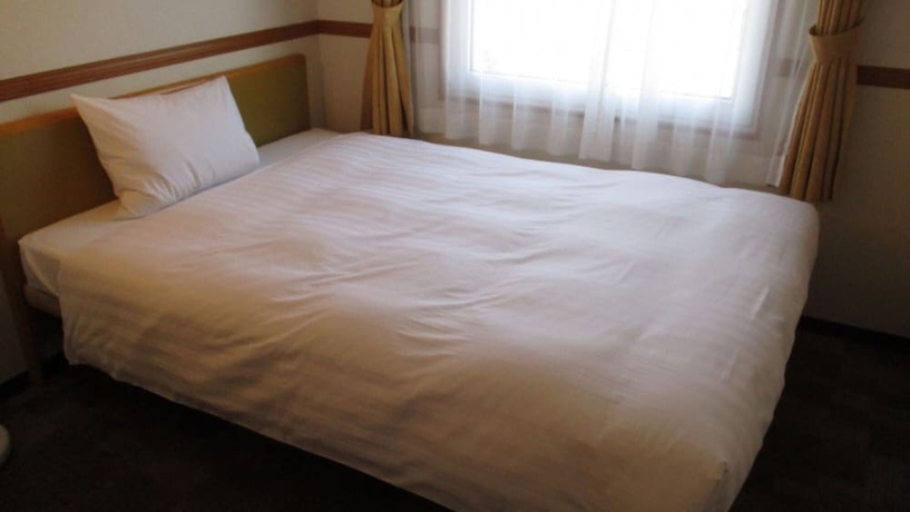 Imagen de la habitación del Hotel Toyoko Inn Okinawa Naha Omoromachi Ekimae. Foto 6