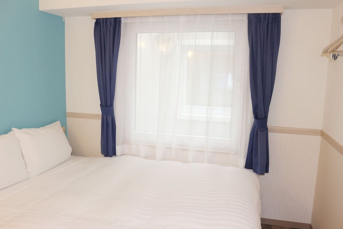 Imagen de la habitación del Hotel Toyoko Inn Omori. Foto 3