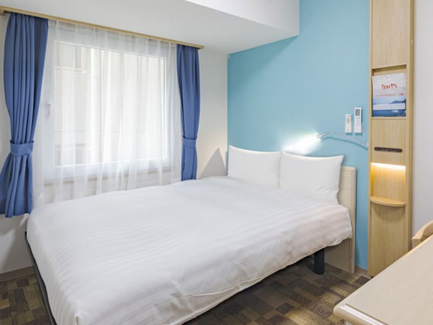 Imagen de la habitación del Hotel Toyoko Inn Osaka Bentencho. Foto 3