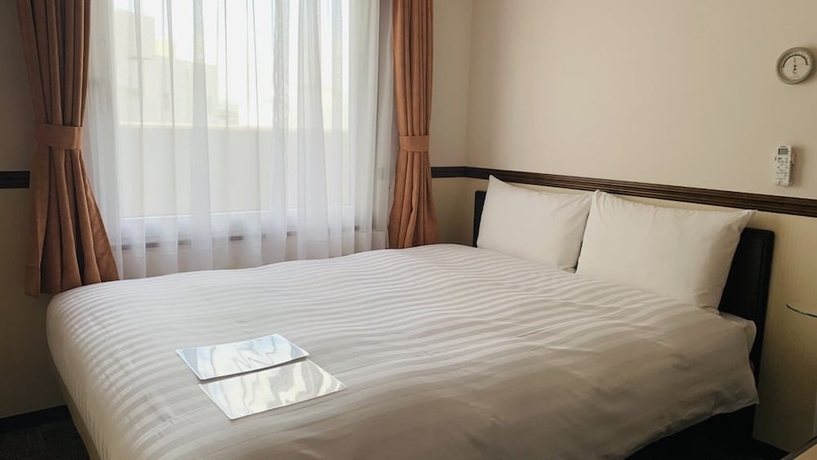Imagen de la habitación del Hotel Toyoko Inn Osaka Itami Kuko. Foto 2