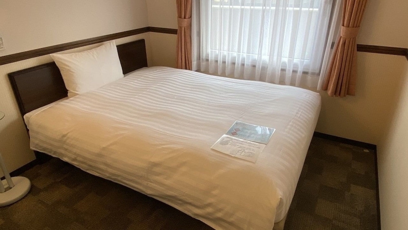 Imagen de la habitación del Hotel Toyoko Inn Osaka Itami Kuko. Foto 4