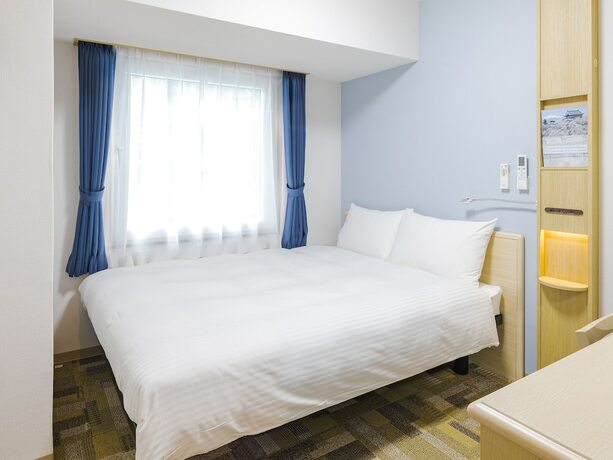 Imagen de la habitación del Hotel Toyoko Inn Osaka Namba. Foto 13