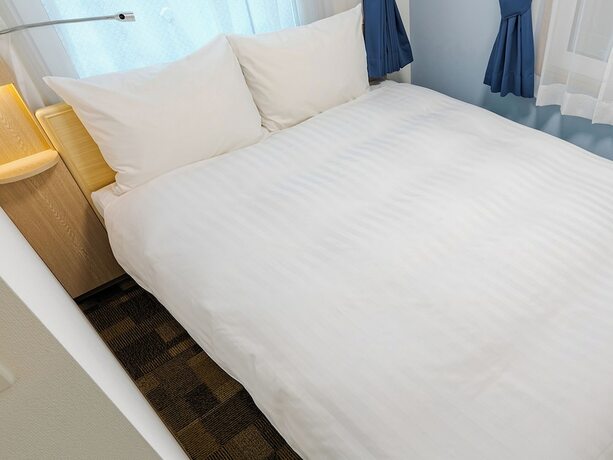 Imagen de la habitación del Hotel Toyoko Inn Osaka Namba. Foto 18