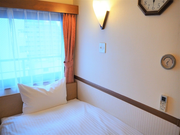 Imagen de la habitación del Hotel Toyoko Inn Osaka Semba Higashi. Foto 6