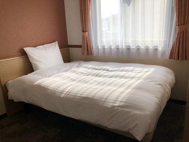 Imagen de la habitación del Hotel Toyoko Inn Osaka Temmabashi Otemae. Foto 6