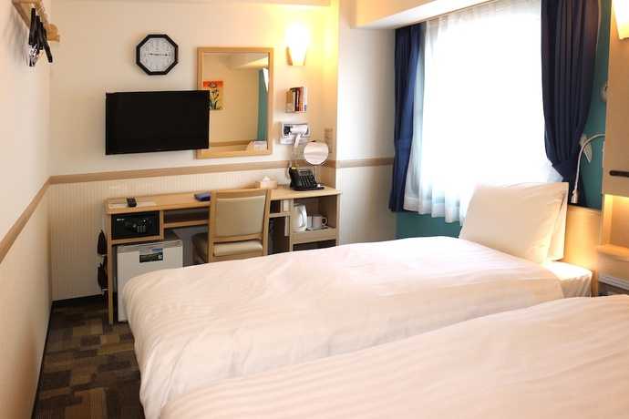 Imagen de la habitación del Hotel Toyoko Inn Osaka Tenjimbashi-suji Rokuchome. Foto 11