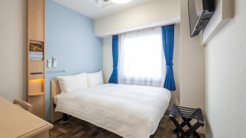 Imagen de la habitación del Hotel Toyoko Inn Sakai Ekimae. Foto 11