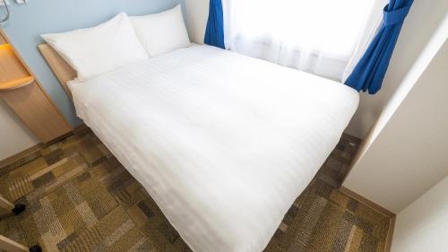 Imagen de la habitación del Hotel Toyoko Inn Sakai Ekimae. Foto 12