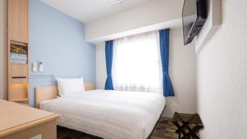Imagen de la habitación del Hotel Toyoko Inn Sakai Ekimae. Foto 13
