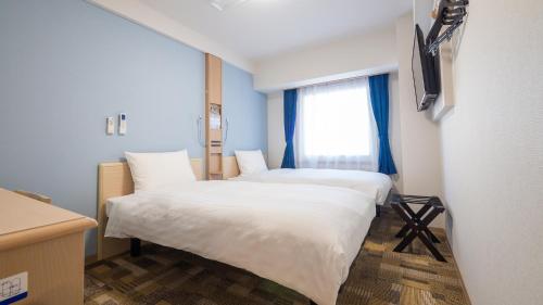Imagen de la habitación del Hotel Toyoko Inn Sakai Ekimae. Foto 17