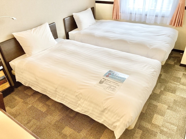 Imagen de la habitación del Hotel Toyoko Inn Shin Osaka Higashi Mikuni Station. Foto 9