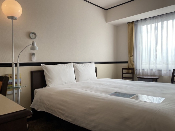 Imagen de la habitación del Hotel Toyoko Inn Shin Takaoka Station Shinkansen Minami. Foto 12