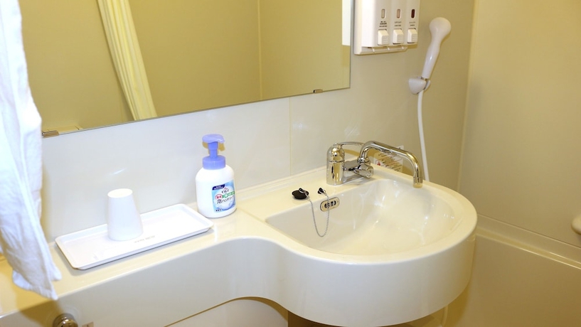 Imagen de la habitación del Hotel Toyoko Inn Shin Takaoka Station Shinkansen Minami. Foto 13